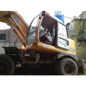 Bán máy muc xúc HYUNDAI 1400-7- SX 2006