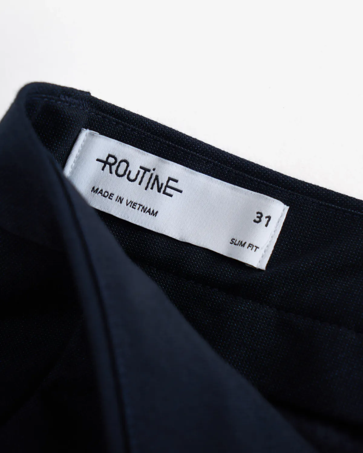 Quần dài vải phối chỉ