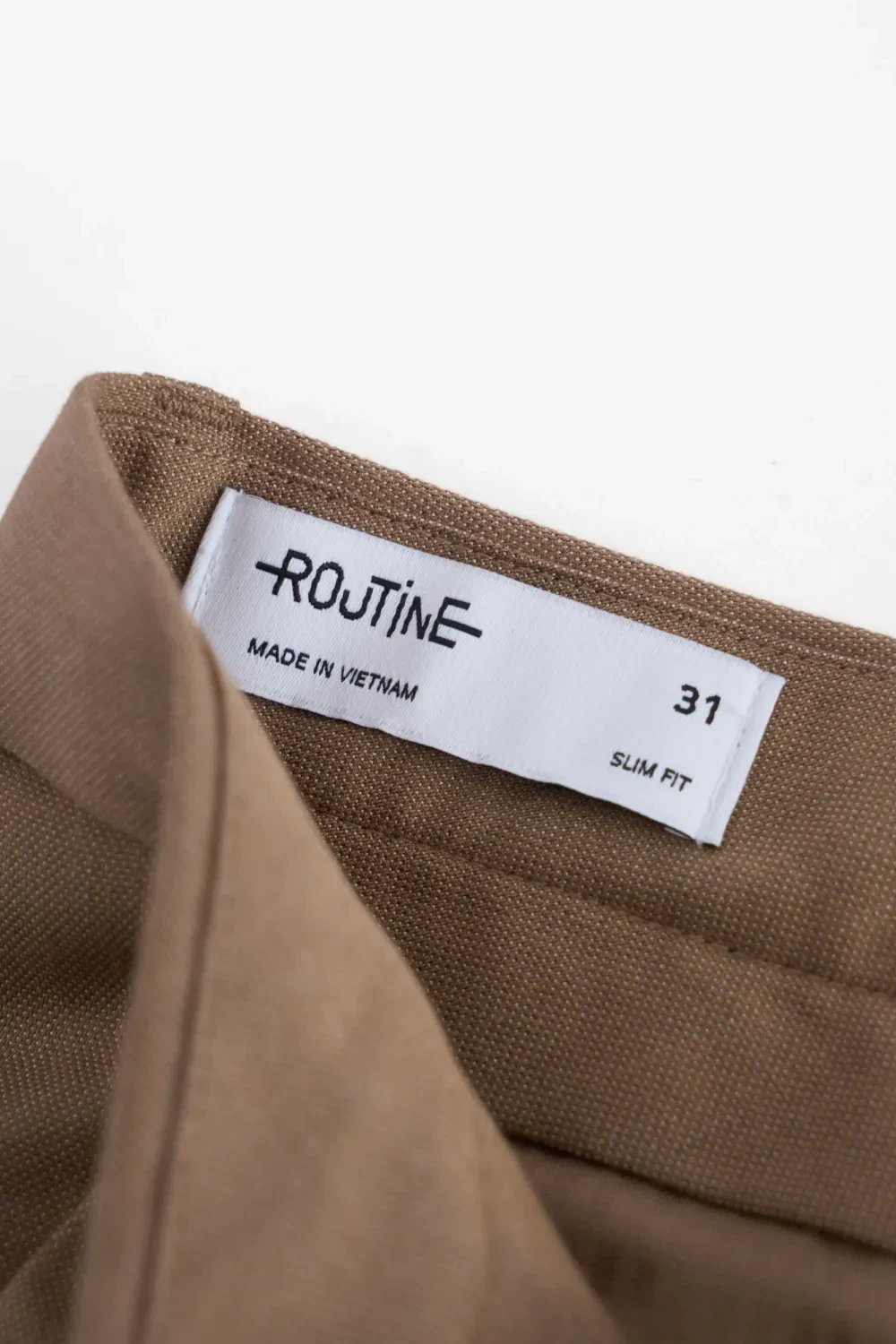 Quần dài vải phối chỉ