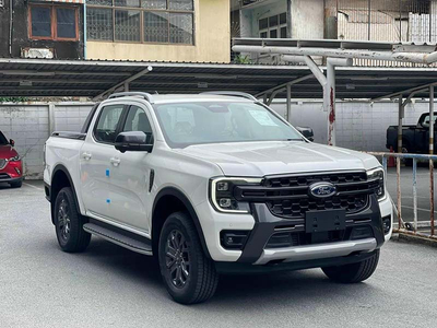 Ford Ranger Wildtrak 10AT 4X4 (Vàng Lux/ Đỏ Cam)