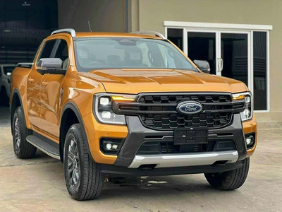 Ford Ranger Wildtrak 10AT 4X4 (Vàng Lux/ Đỏ Cam)