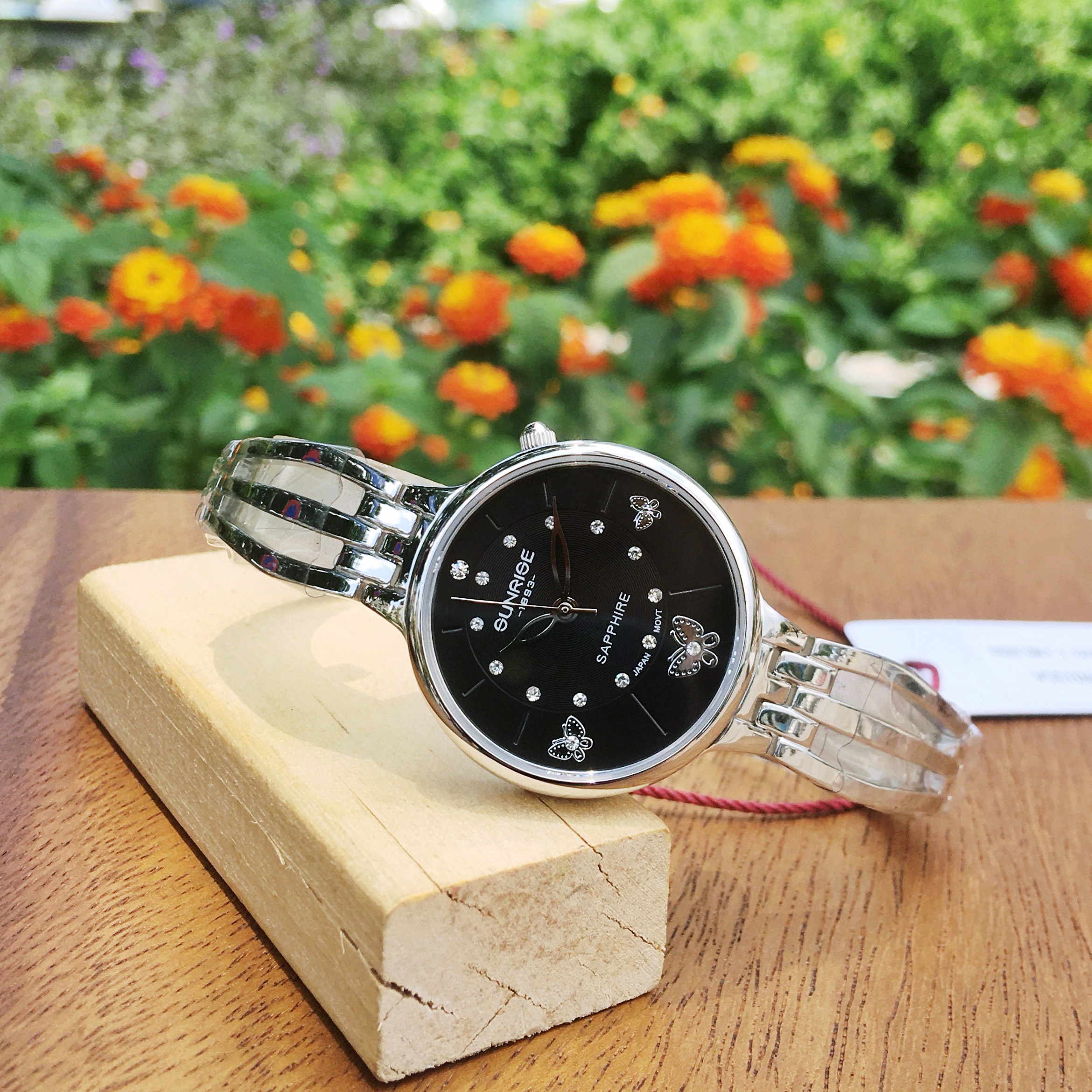 ĐỒNG HỒ LẮC NỮ SUNRISE 9012SWA CHÍNH HÃNG