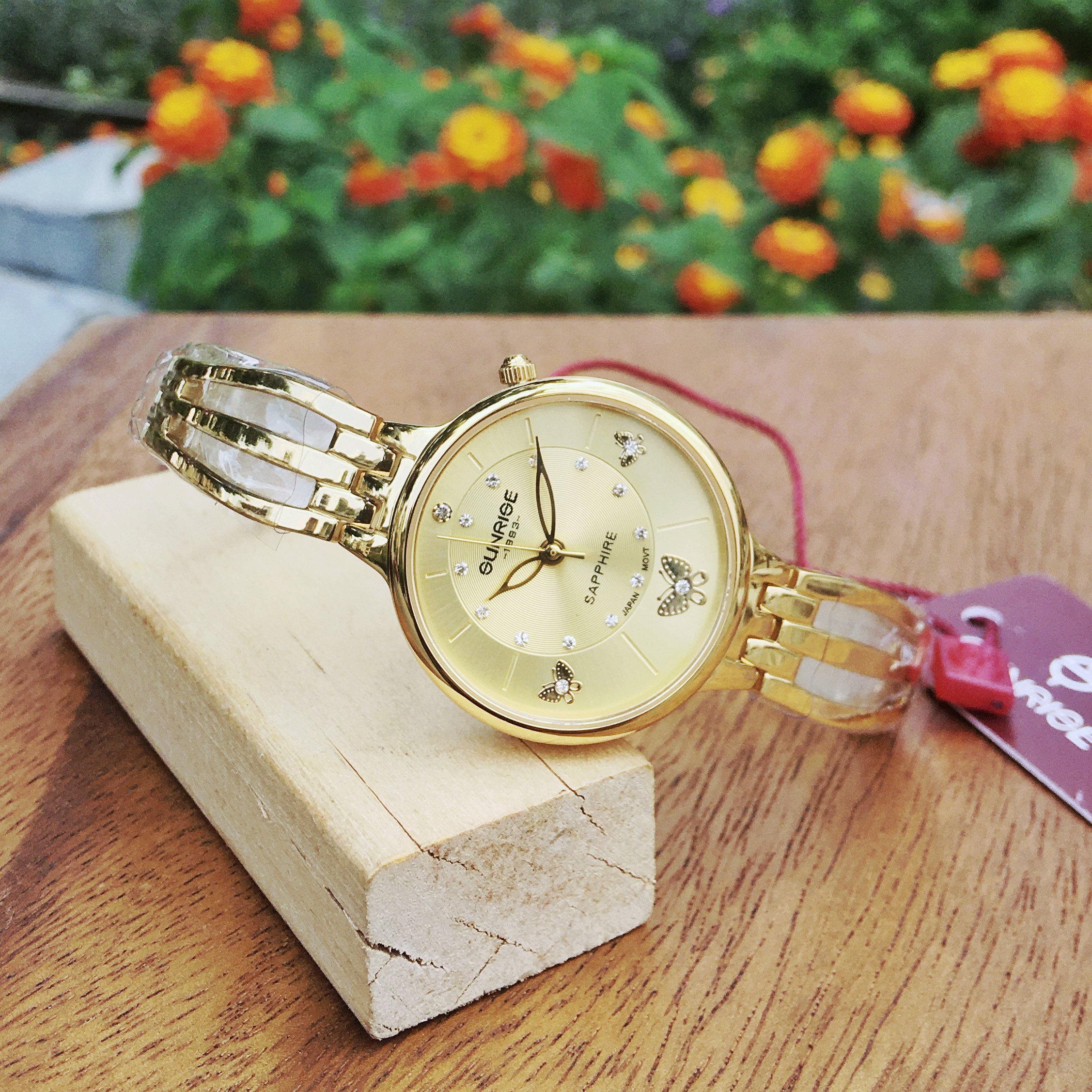 ĐỒNG HỒ LẮC NỮ SUNRISE 9012SWA CHÍNH HÃNG