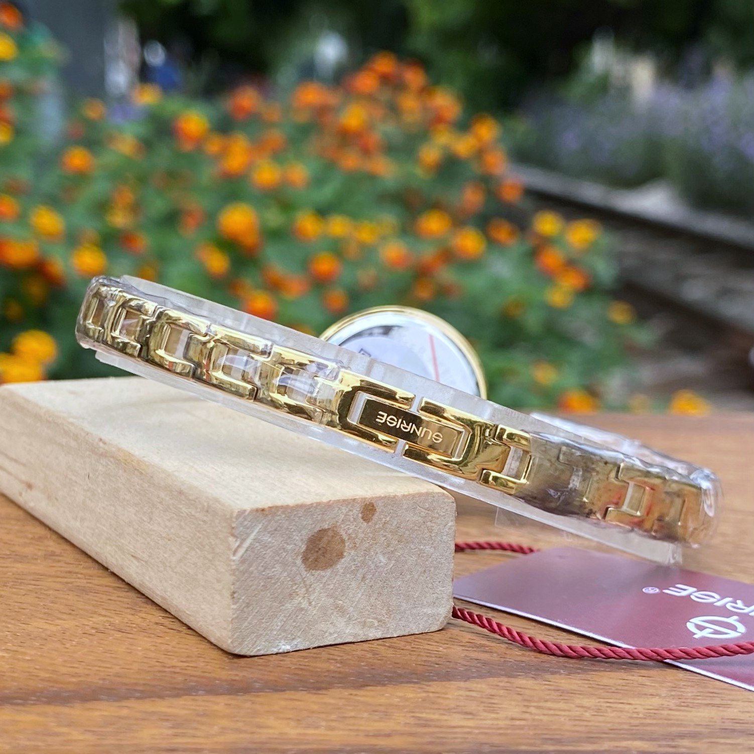 ĐỒNG HỒ LẮC NỮ SUNRISE SL715SWA CHÍNH HÃNG