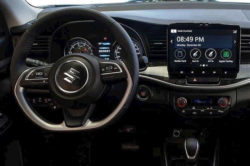 Vô lăng XL7 Hybrid được bọc da và vát chử D thể thao