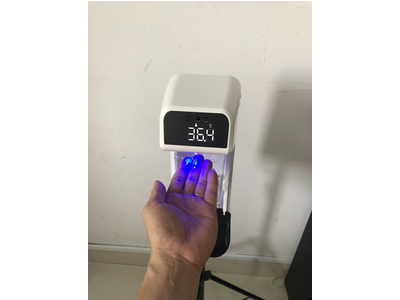 Thermometer for measuring body temperature and hand sanitizer 2 in 1 for Karaoke bars, restaurants, restaurants, conference centers