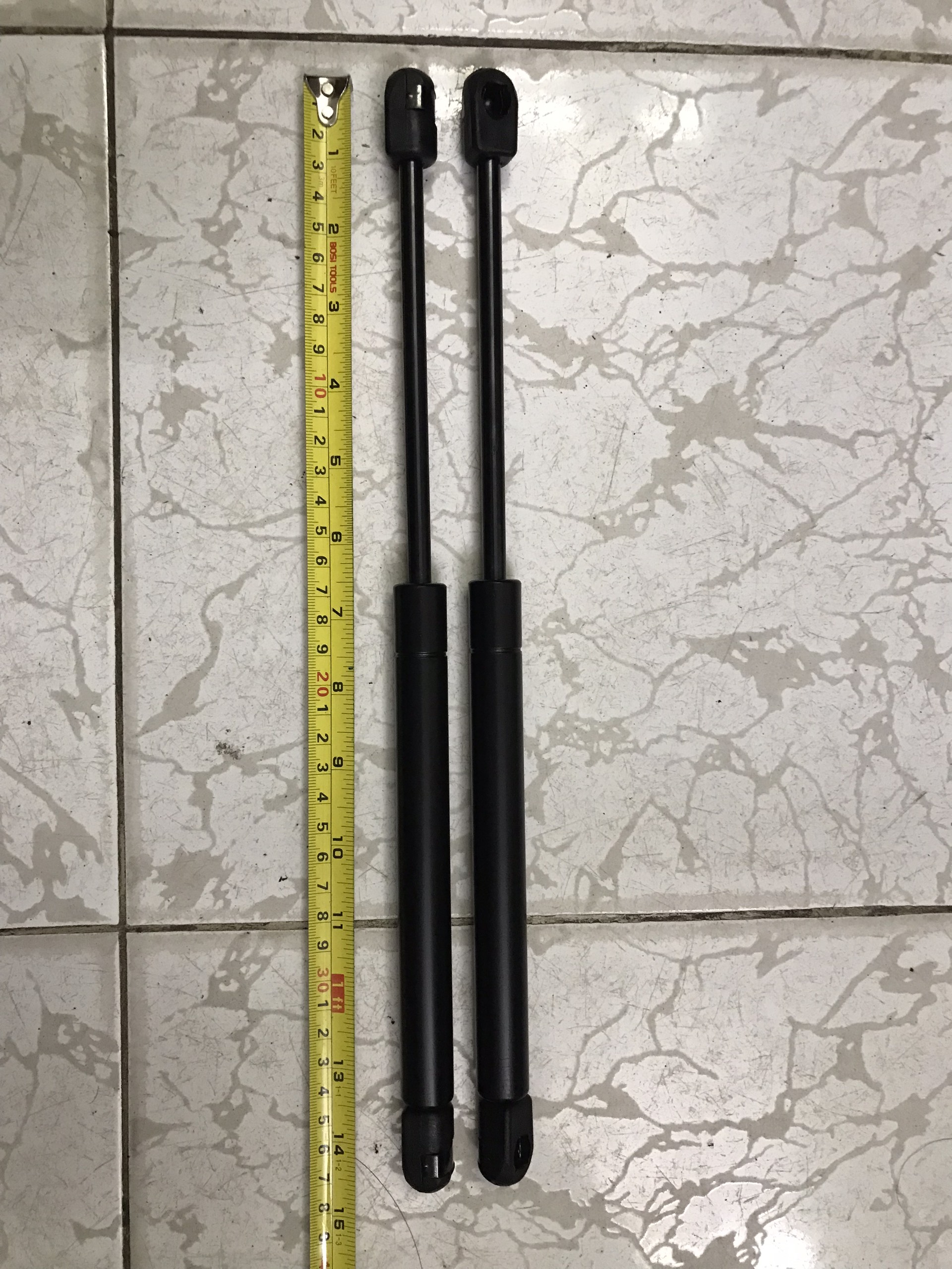 Ty chống nắp capô Toyota Camry 1998-2005