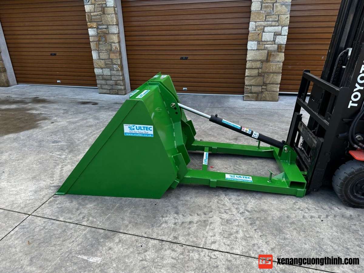 Xe nâng gắn gầu xúc - Xe nâng xúc lật